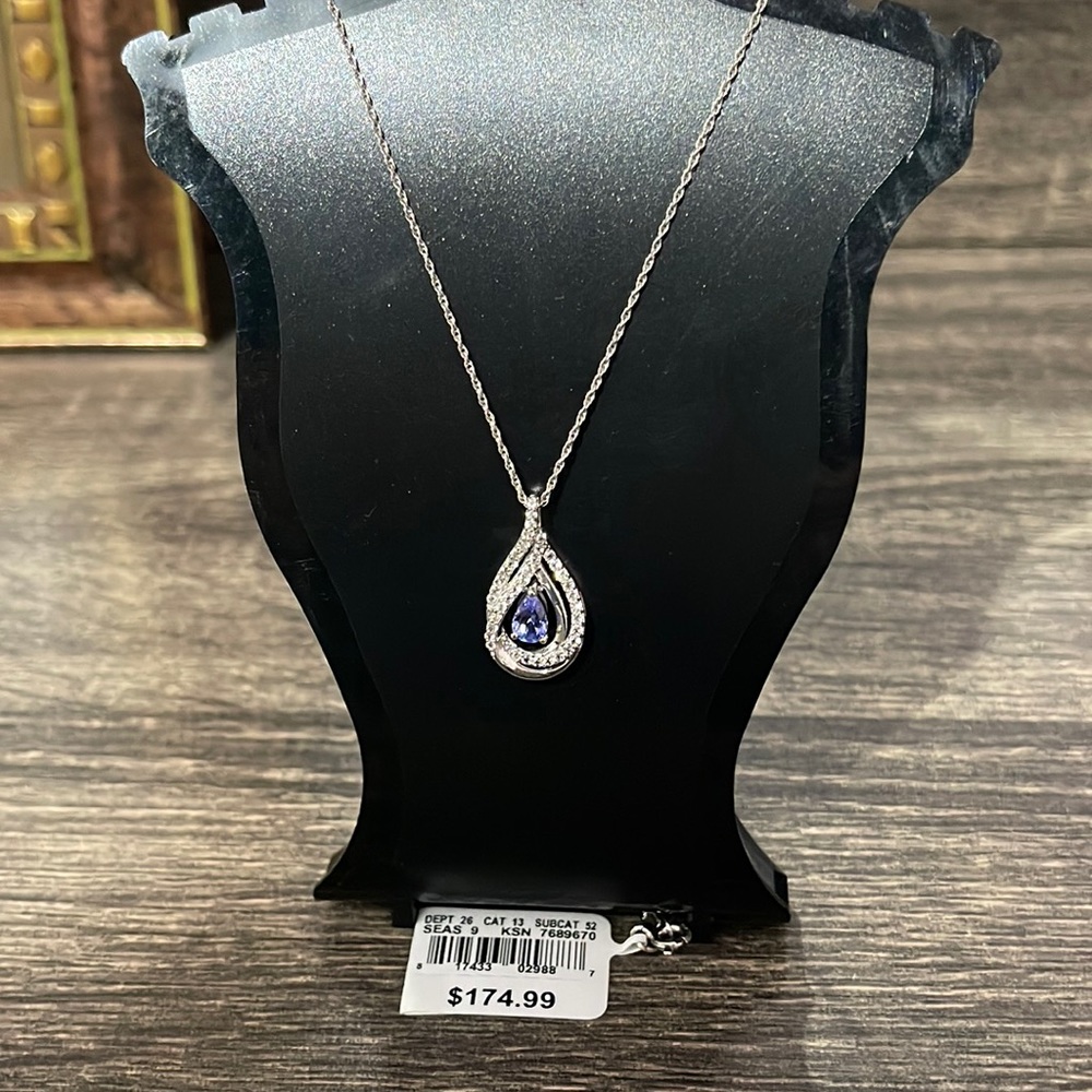 Beautiful Multiband “floating” pendant with 16” chain new eith tags never used